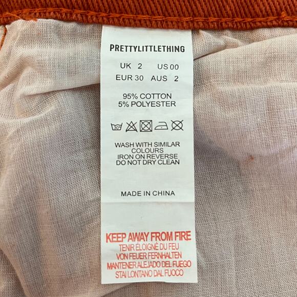 Pretty Little Thing Rust Split Hem High Rise Jeans in Rust Size 00 Petite - Picture 10 of 11